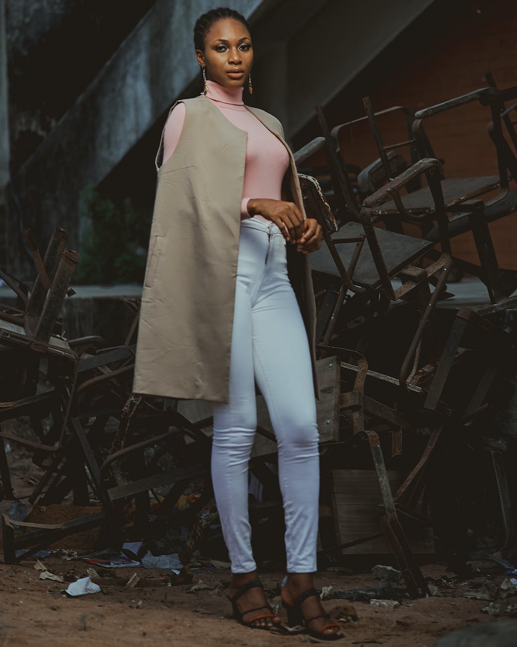 woman in pink long sleeve shirt and white pants